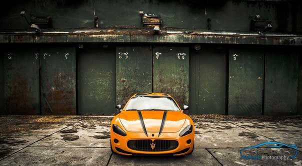 Orange Maserati GranTurismo 4.2 l SPerformance. - 4