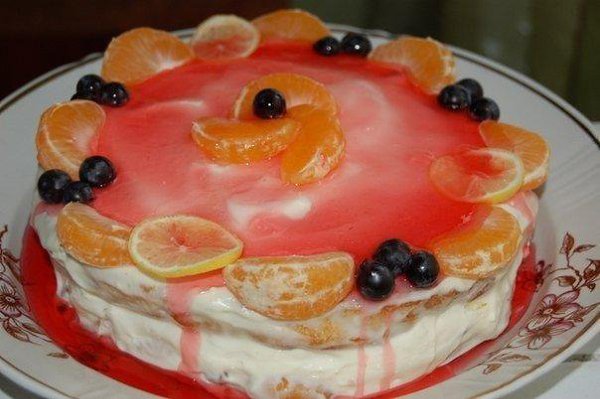 Бисквитный торт с творожной прослойкой и желе.Ингредиенты:- 6 яиц- 1 стакан сахара- 1 стакан муки- 1 ...