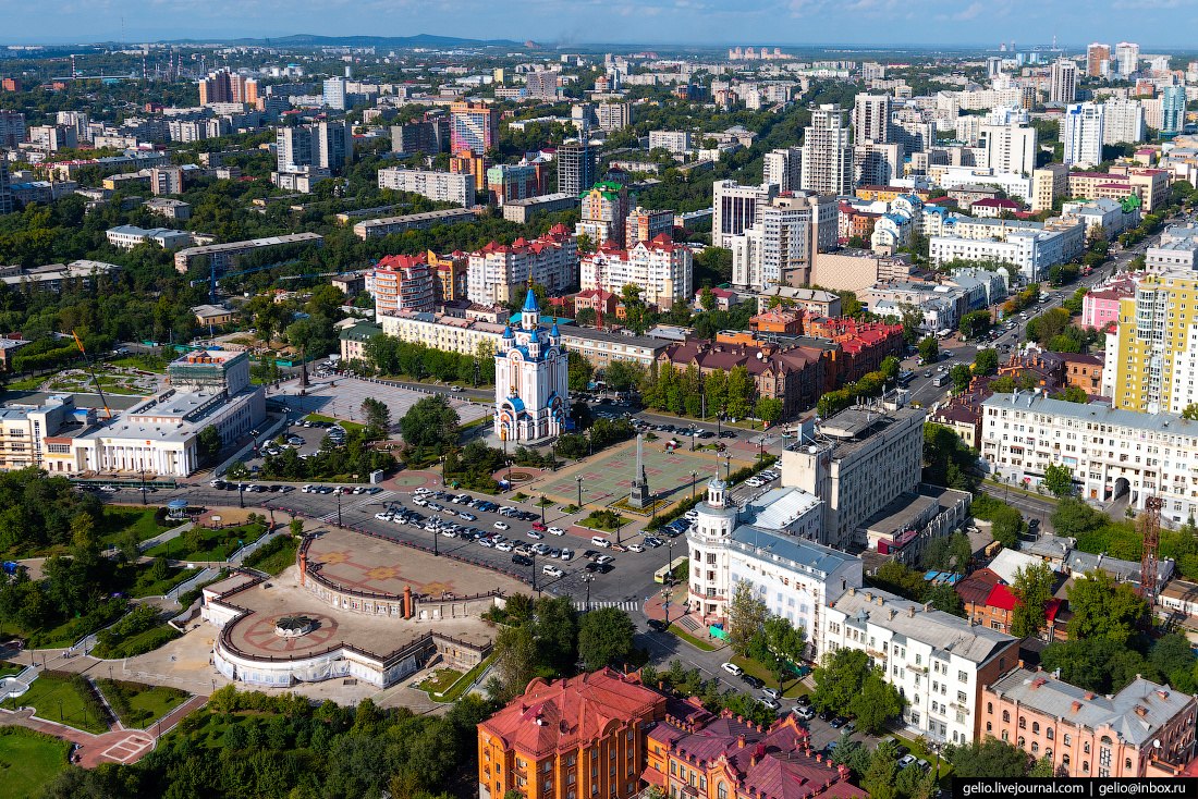 Город расположен на юго. Комсомольская площадь Хабаровск. Комсомольская площадь в Хабаровске с высоты. Современный Хабаровск. Хабаровский край город Хабаровск.