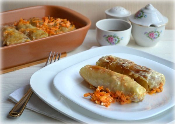Постные голубцы с рисом.Ингредиенты:Капуста белокочанная - 1 кочанРис - 250 гШампиньоны ...