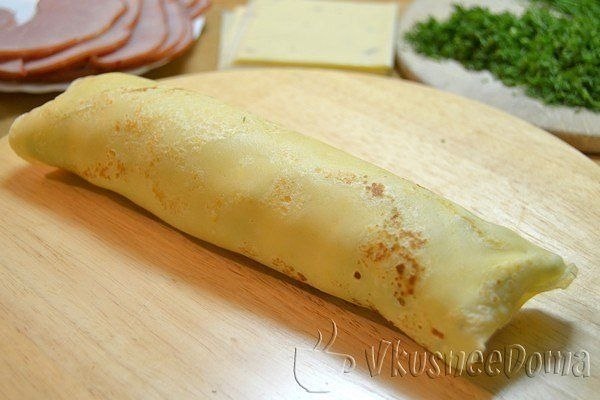 Блинные рулетики с начинкой из ветчины и сыра.Очень вкусная и лёгкая в приготовлении ... - 4