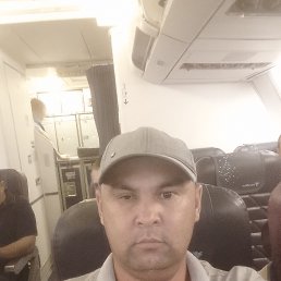komil, 38, 