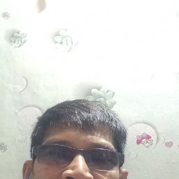 Alexander Katiandagho, 45, 